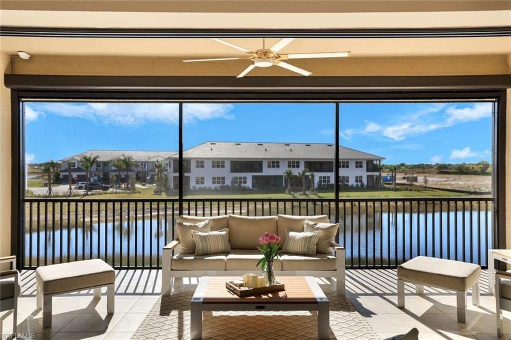 Covered lanai overlooking tranquil water views—an inviting space for relaxing or entertaining outdoors.