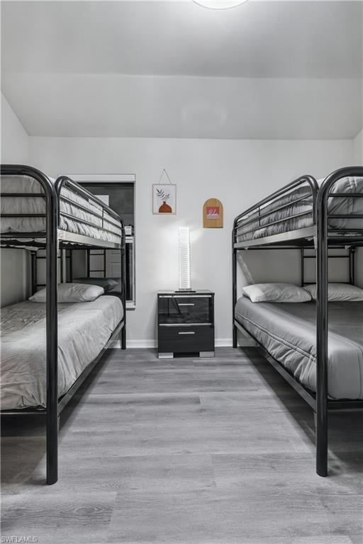 Bedroom with light wood-style flooring
