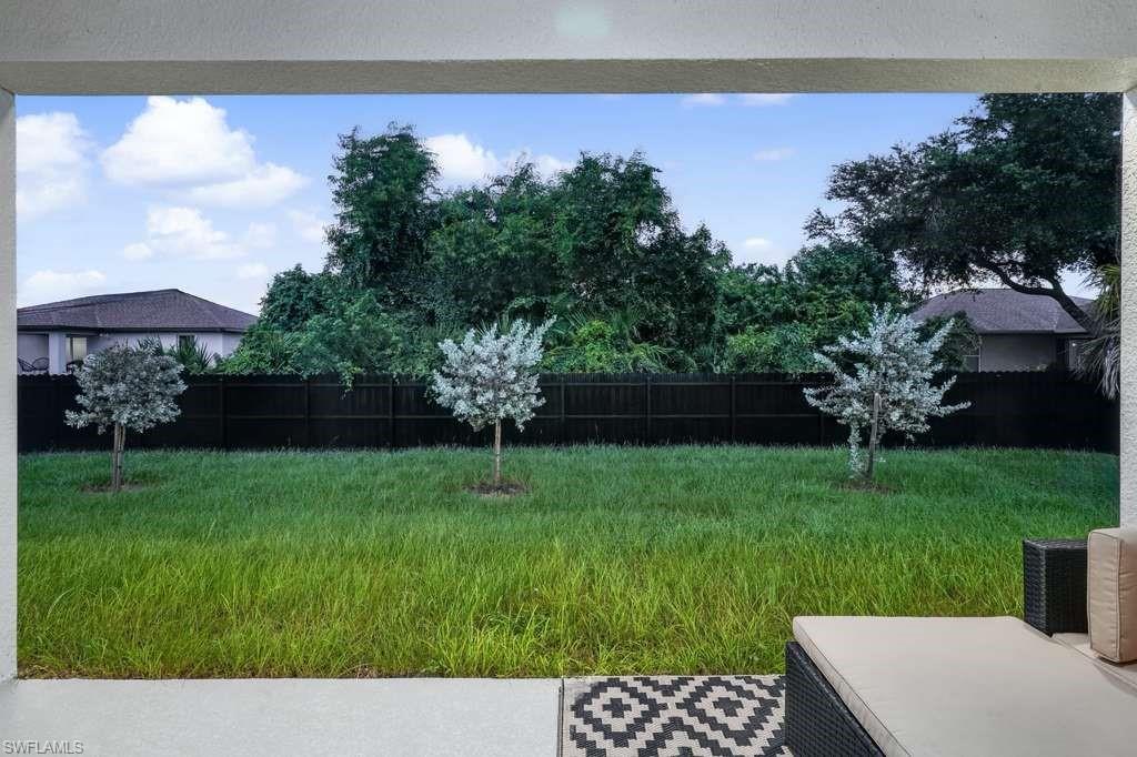 Fenced yard featuring a patio area