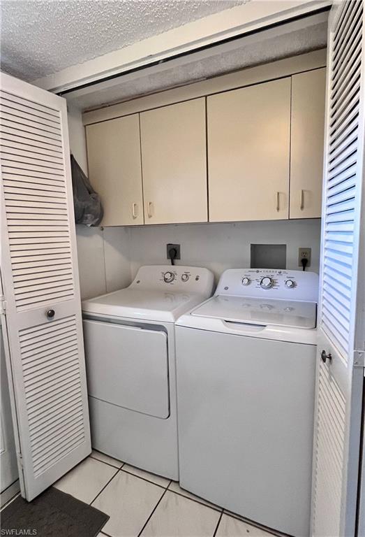 In unit laundry and storage accessible from the kitchen area.