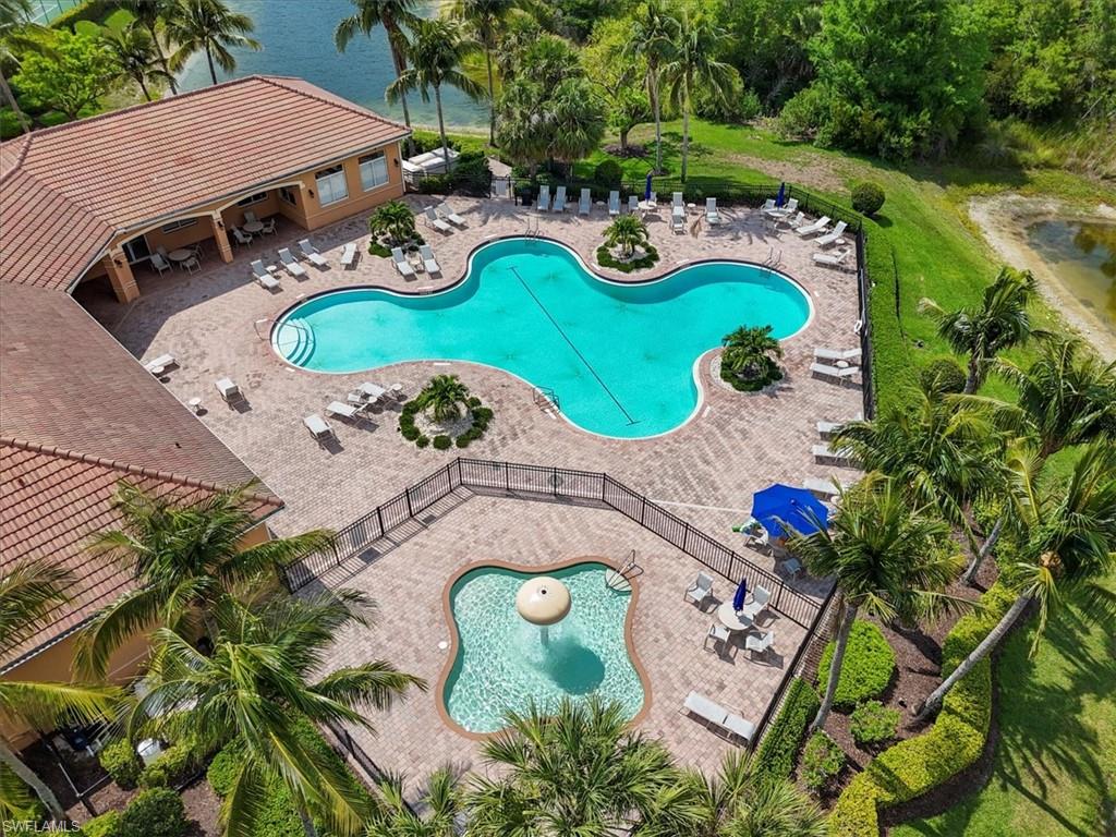 Community pool featuring a patio