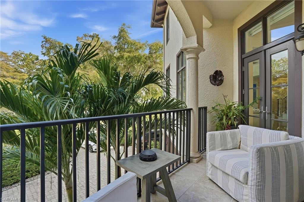 Balcony featuring french doors
