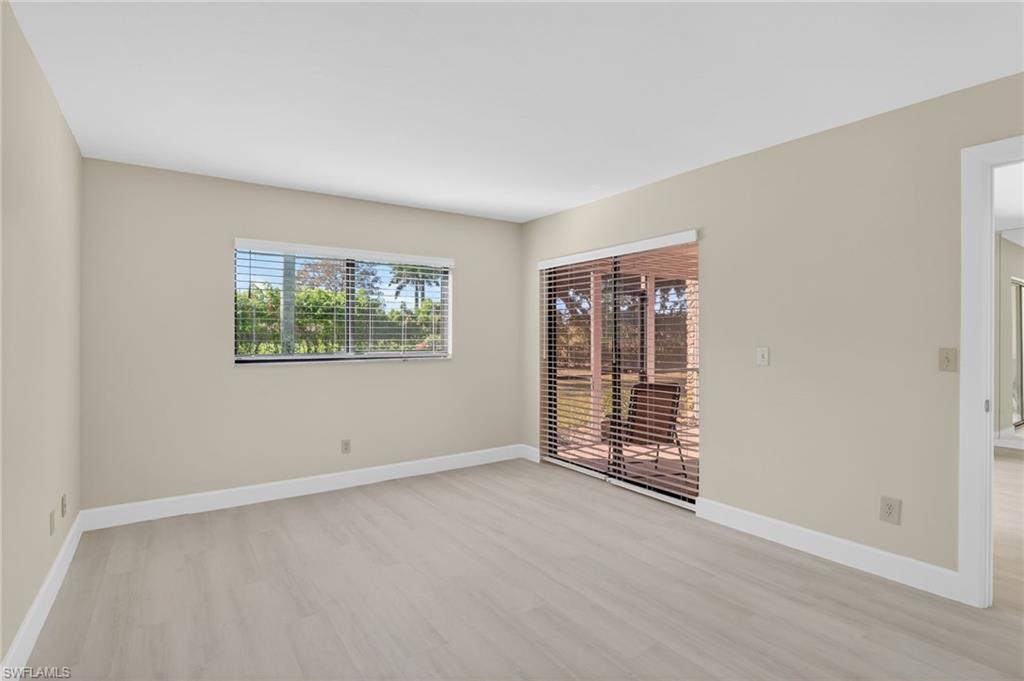 Master bedroom with baseboards and light vinyl-type flooring
