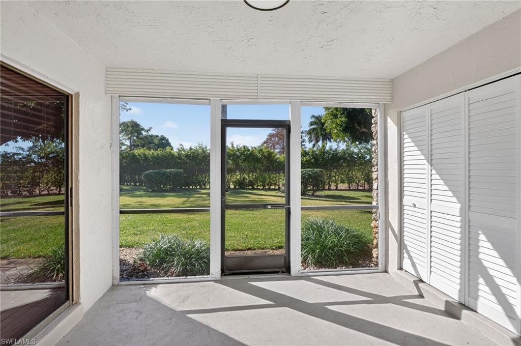 Unfurnished sunroom with healthy amount of natural light