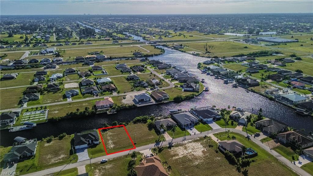 View of property location with property boundaries highlighted and nearby suburban area