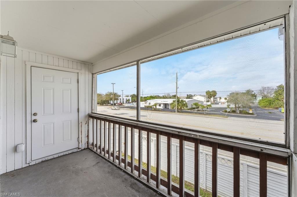 Unfurnished sunroom with a residential view