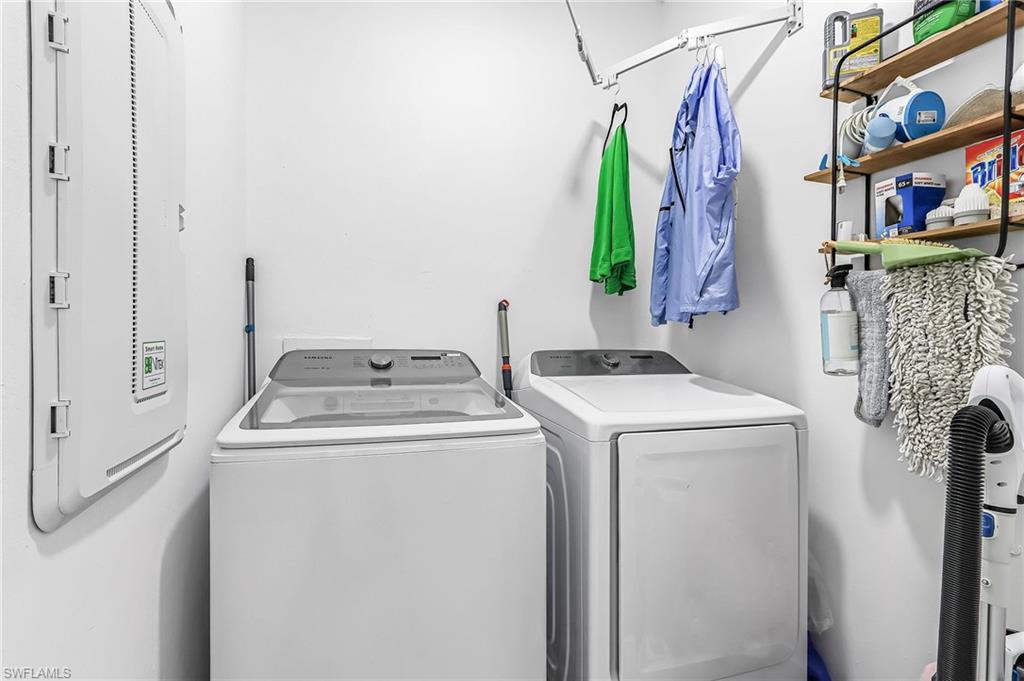 Laundry area featuring washer and clothes dryer