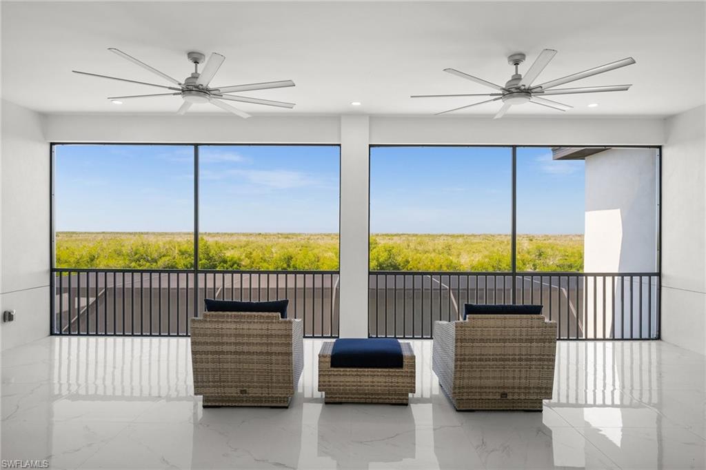 Sunroom / solarium featuring plenty of natural light