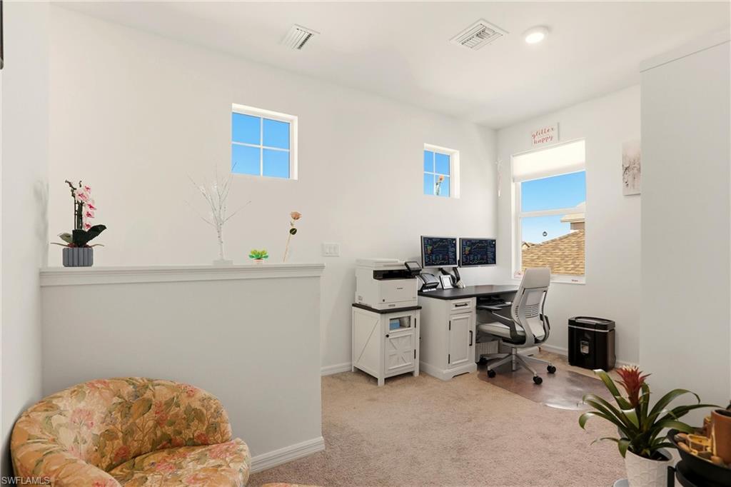 Office space featuring plenty of natural light