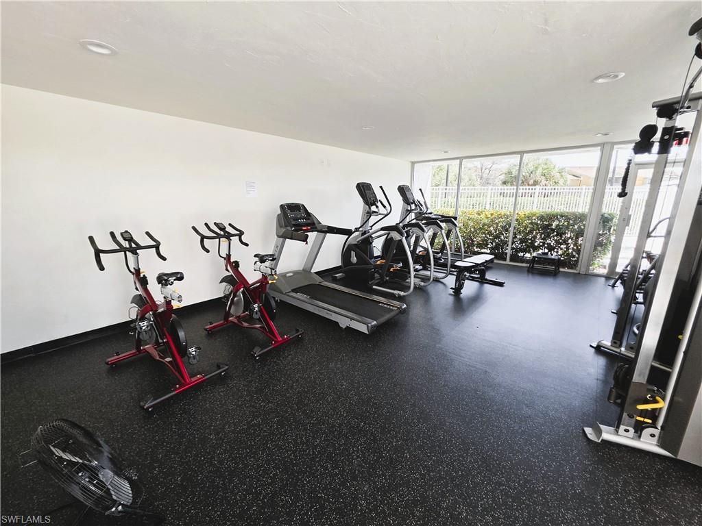 Workout area with floor to ceiling windows