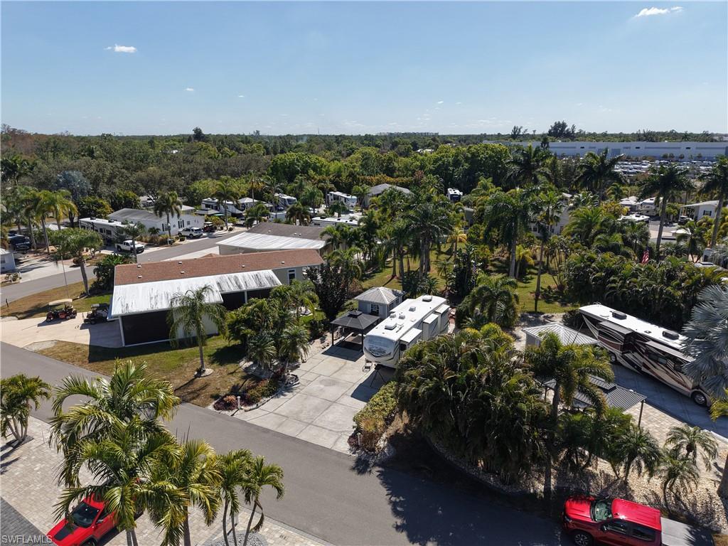 Aerial perspective of suburban area with a tree filled landscape