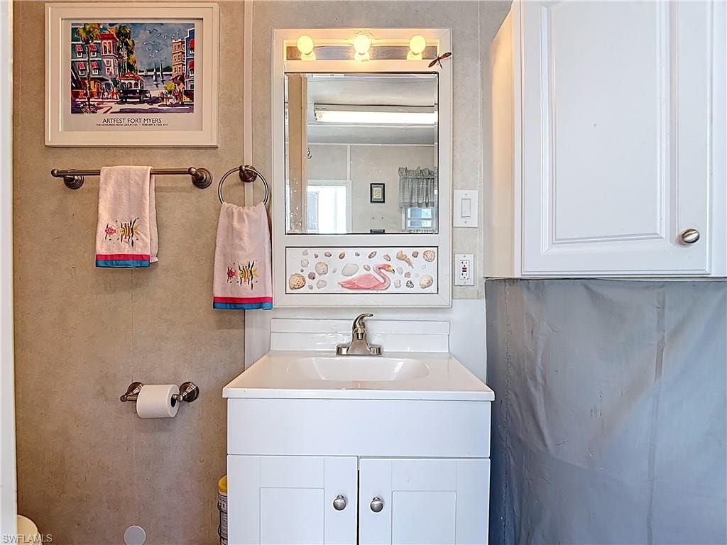 Half bath featuring vanity