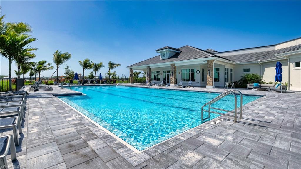 Community pool featuring a patio area