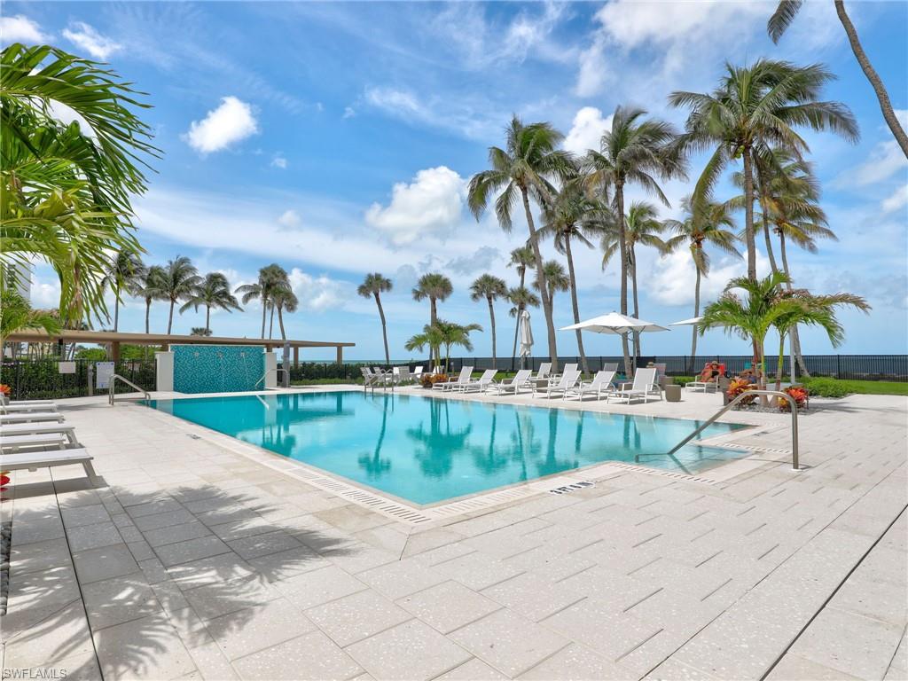 Community pool featuring a patio