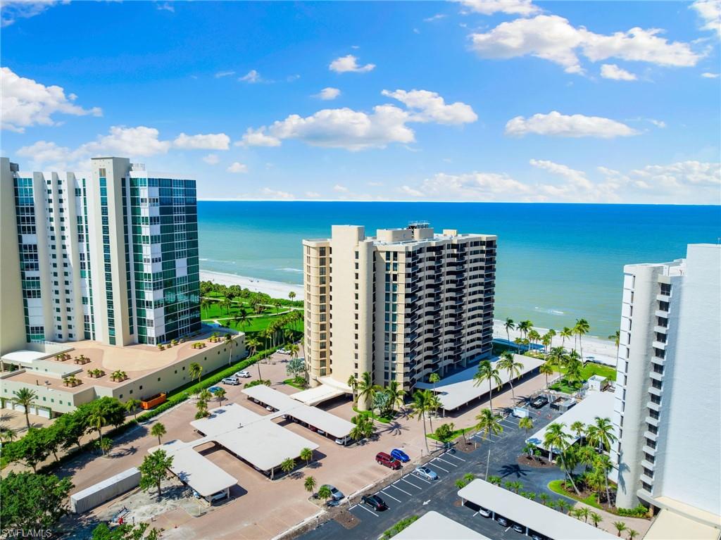 Drone / aerial view featuring a water view and a city view