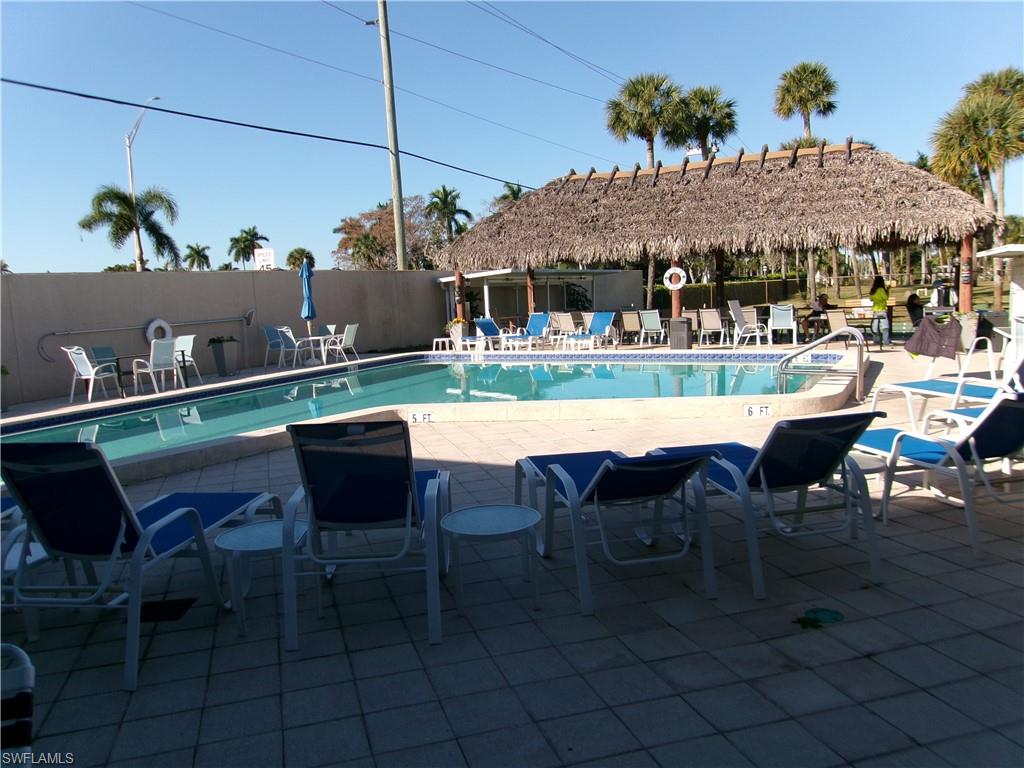 Community pool with a patio area