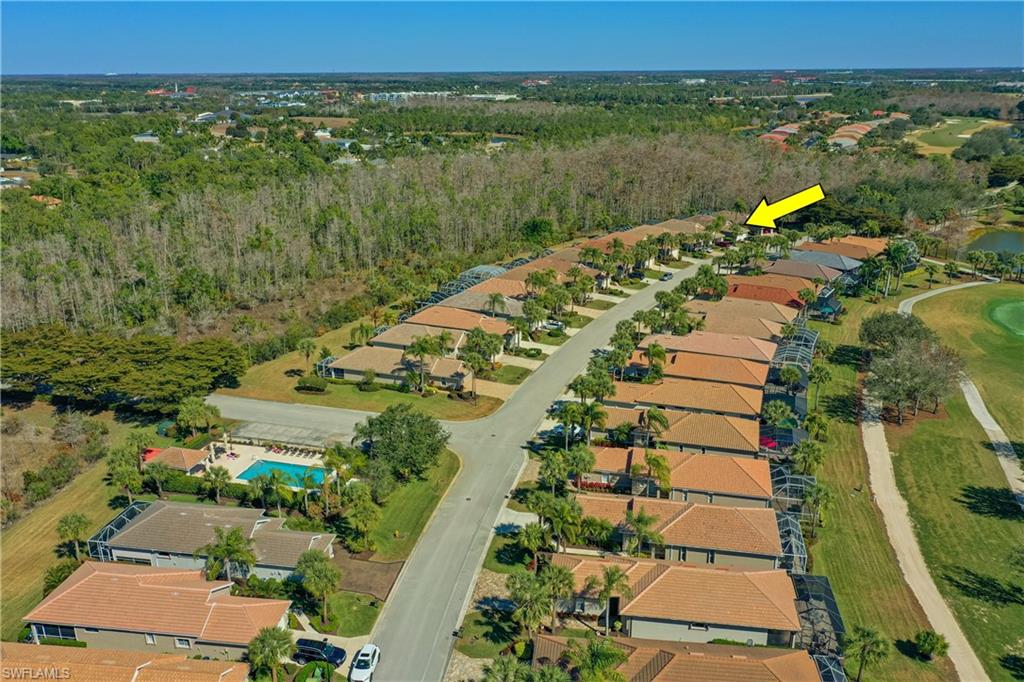 View of property location with nearby suburban area