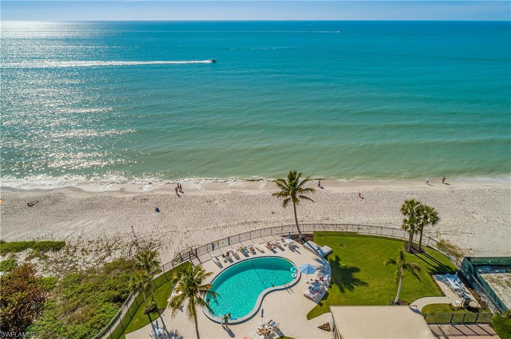 Aerial view of a pool and expansive coastline