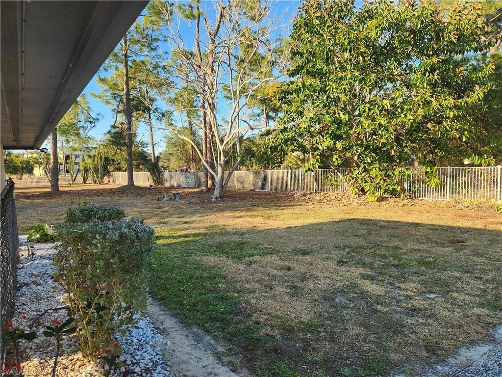 View of fenced backyard