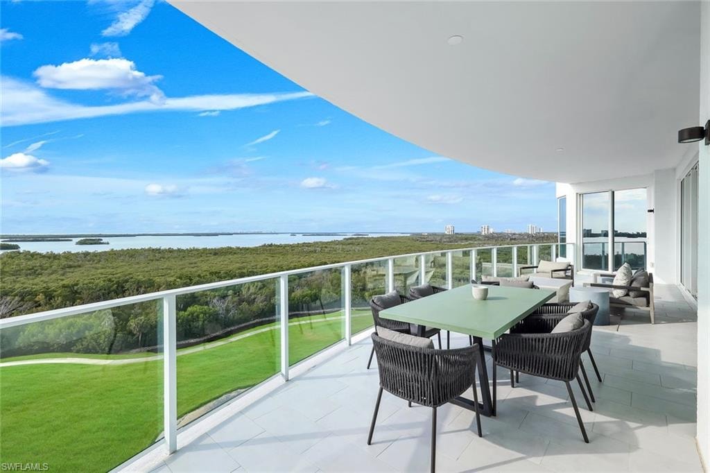 The expansive private balcony offers a seamless extension of the living space, embodying the essence of Florida’s indoor-outdoor lifestyle.