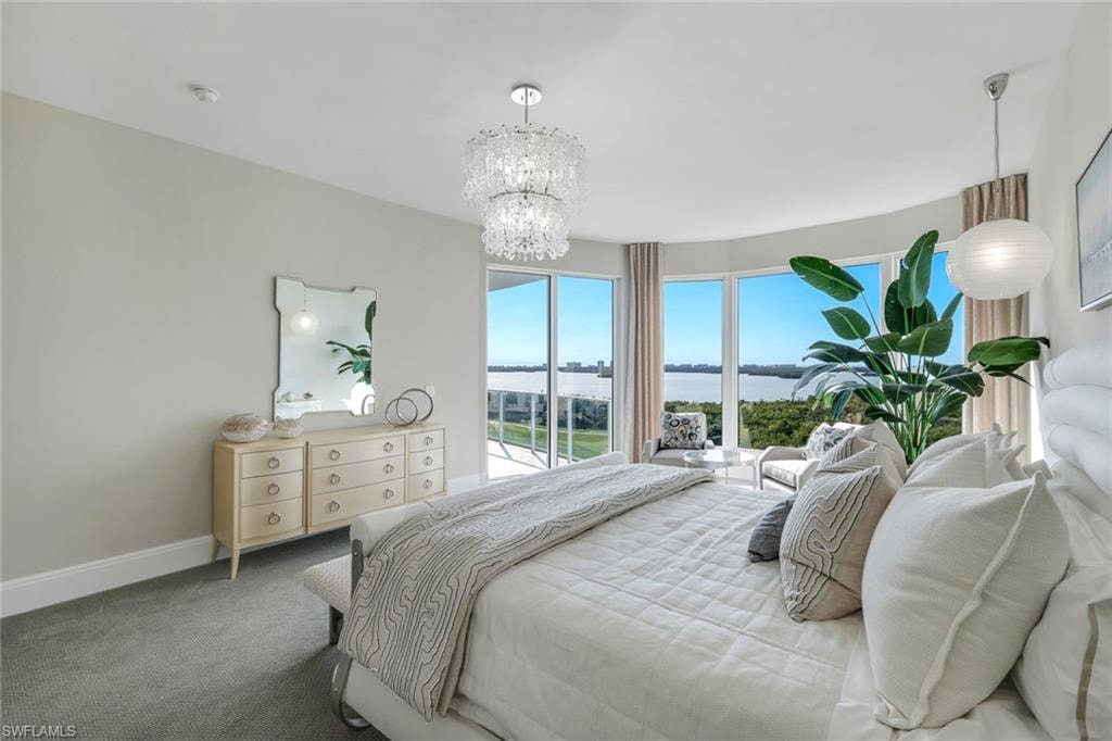 This spectacular primary suite is privately situated on the north side of the residence, offering a serene retreat.