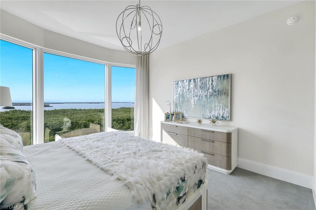 The guest suite is complemented by captivating water views.