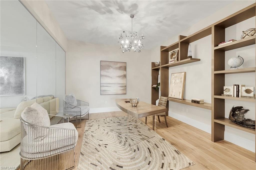 Custom wood built-ins define the office, perfectly positioned in close proximity to the guest bedrooms and adjacent den.