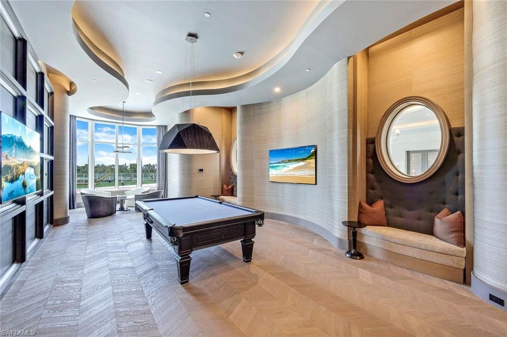 A refined billiards room appointed with sophisticated design touches.