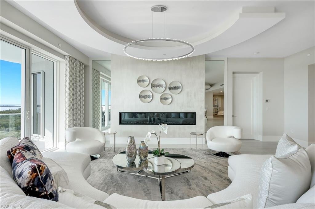 The decorative fireplace lends a warm, inviting ambiance to the space.