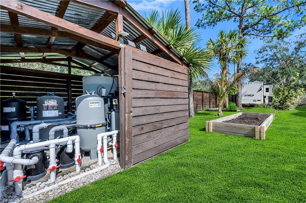 Exterior view of a garden and pump