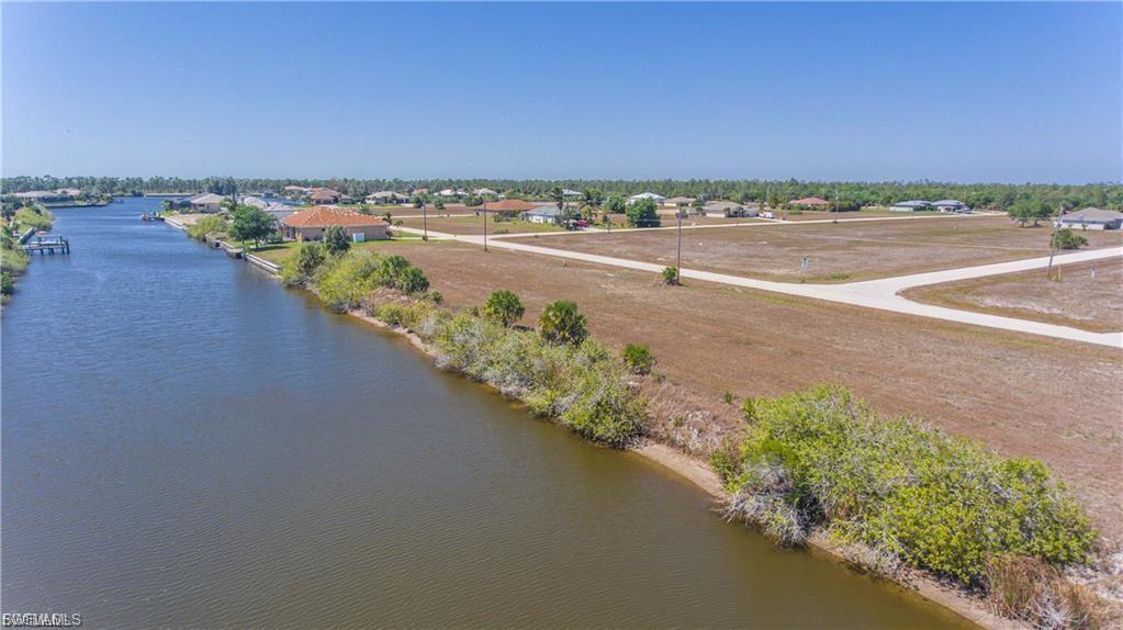 Aerial view of residential area with a nearby body of water