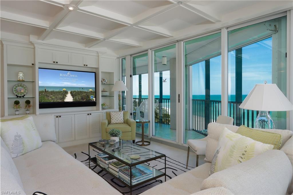 Living area featuring coffered ceiling