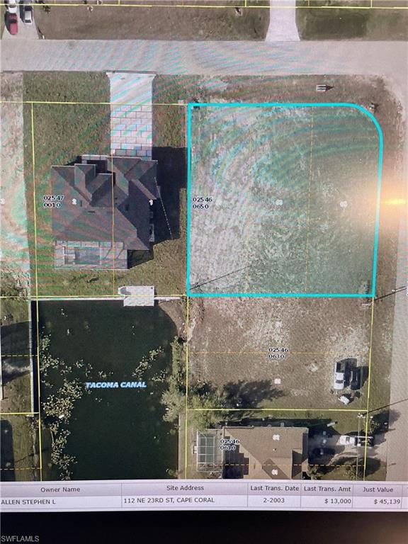 Aerial overview of property's location featuring property parcel outlined