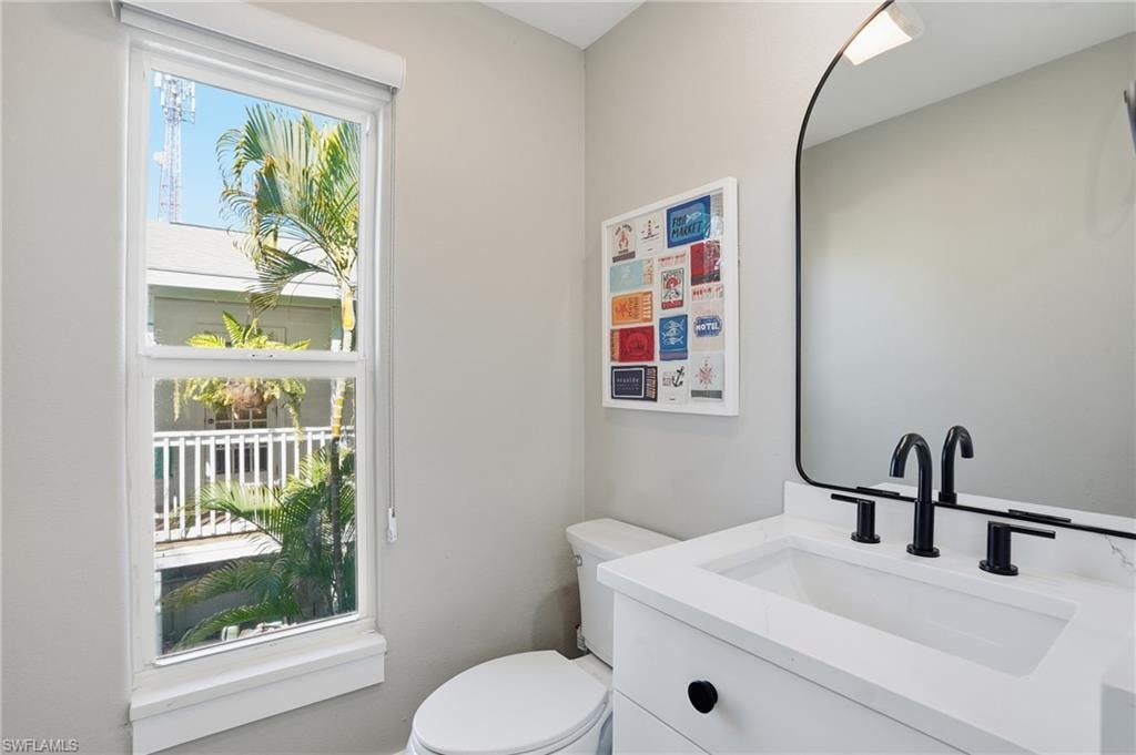 Bathroom with vanity and toilet - Virtually Edited Image