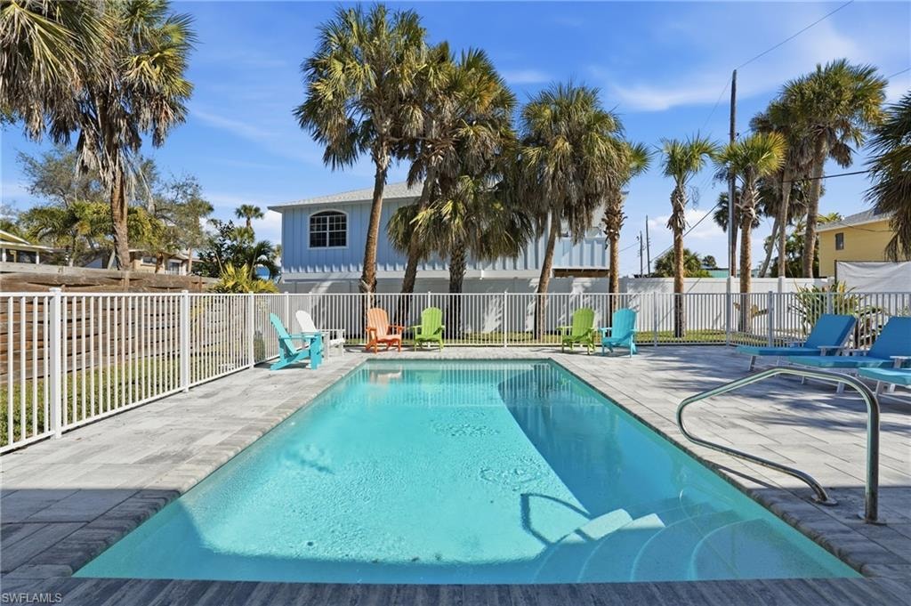 View of pool with patio surround - Virtually Edited Image