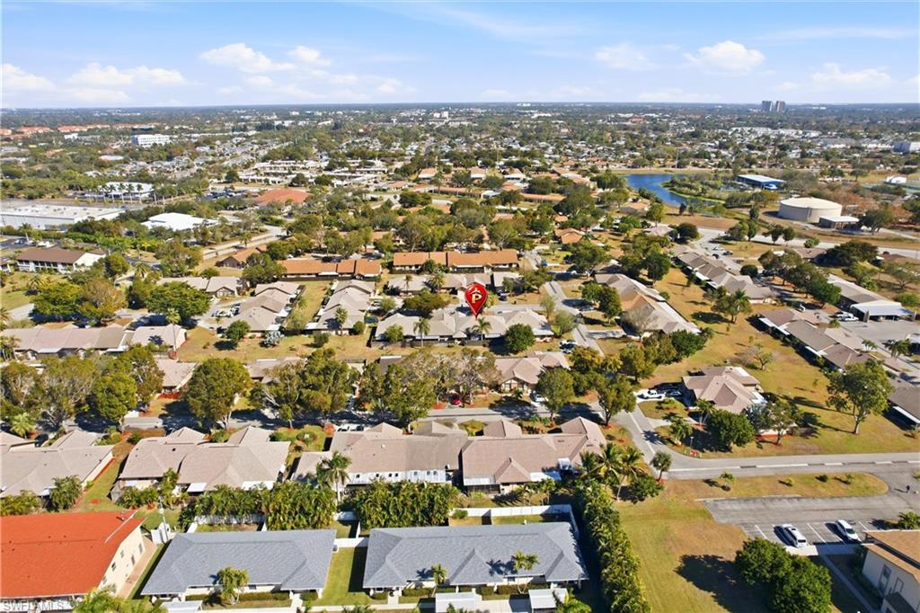 Aerial overview of property's location with nearby suburban area