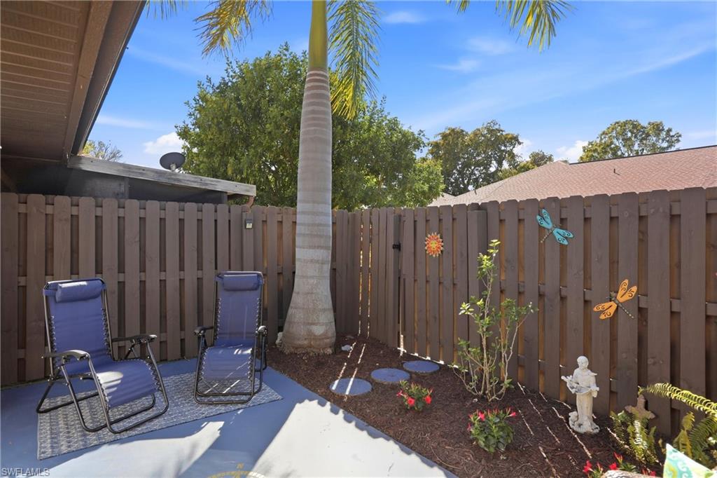Fenced backyard featuring a patio area