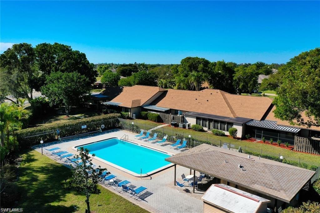 Community pool featuring a patio area