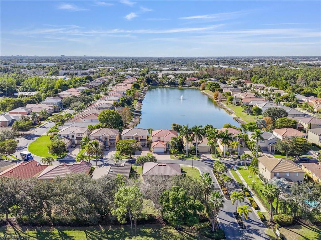 Aerial view of property's location featuring nearby suburban area