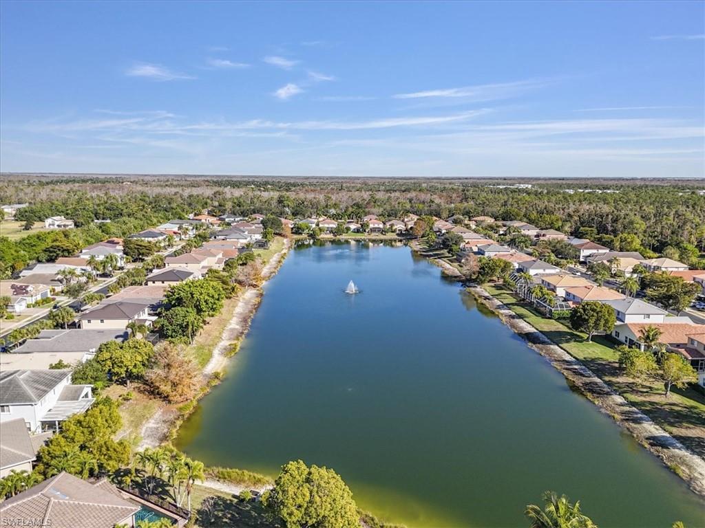 Aerial view of residential area with a nearby body of water