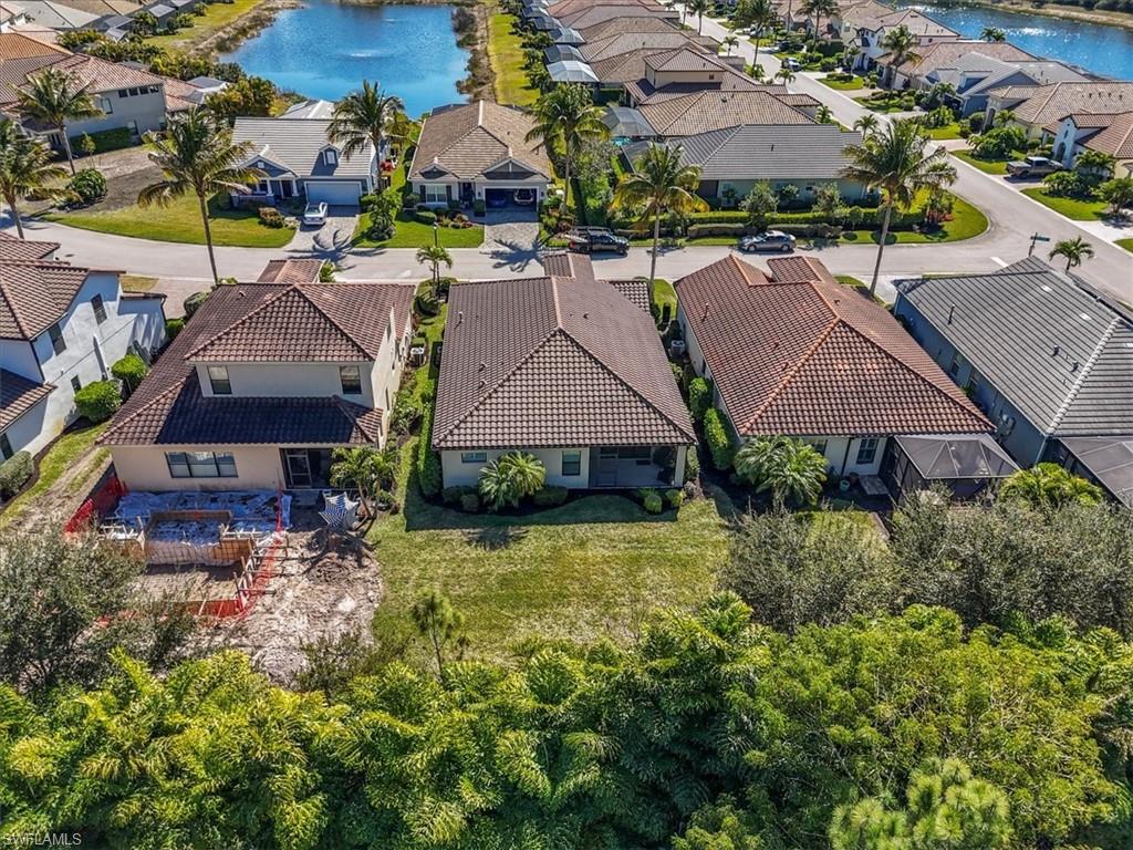 Aerial view of residential area with a large body of water