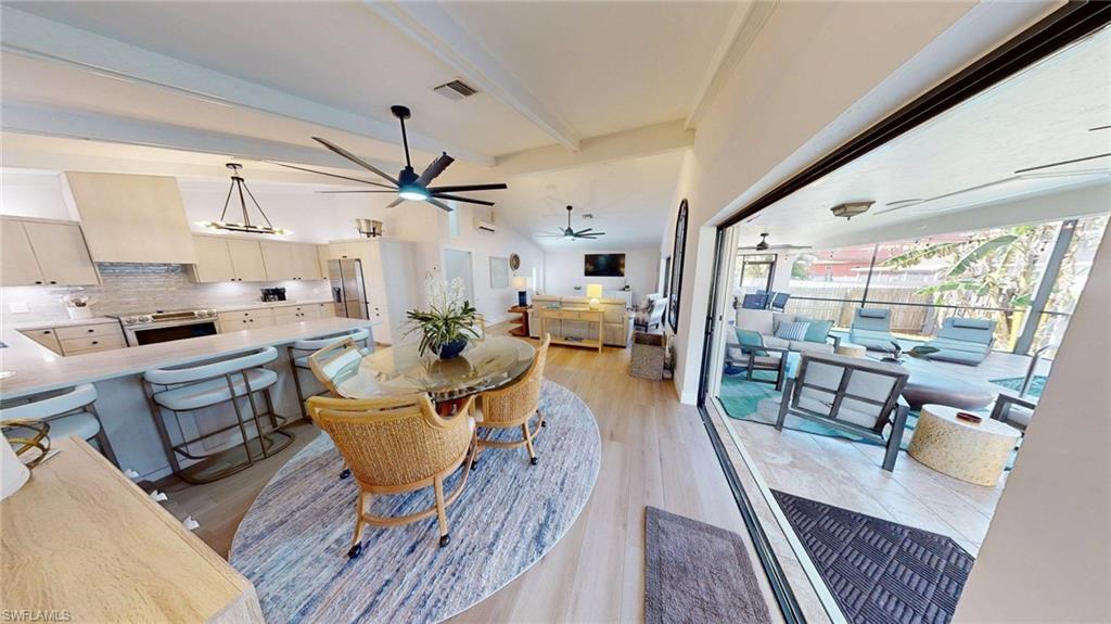 Sliders open fully to the outdoor lanai