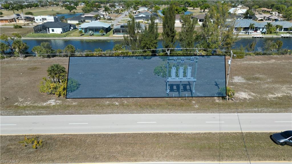 Aerial view of residential area with a nearby body of water