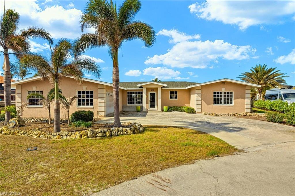 Ranch-style home with a front lawn virtually enhanced images