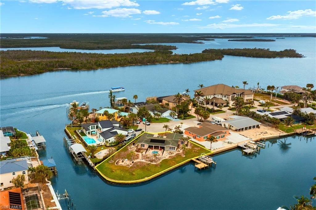 Drone / aerial view with a water view virtually enhanced images