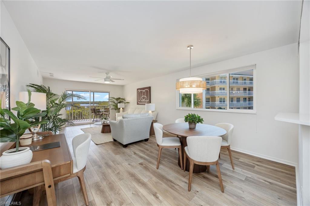 Dining room featuring light wood-style floors and ceiling fan