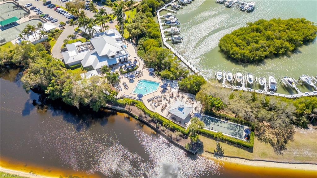 Aerial view of Tarpon Cove Yacht & Racquet Club along with the Wiggins Bay Docks