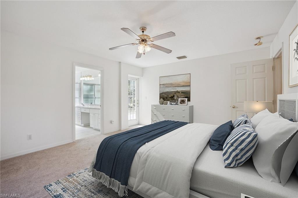 VIRTUALLY Staged primary bedroom featuring carpet, ceiling fan, and ensuite bathroom