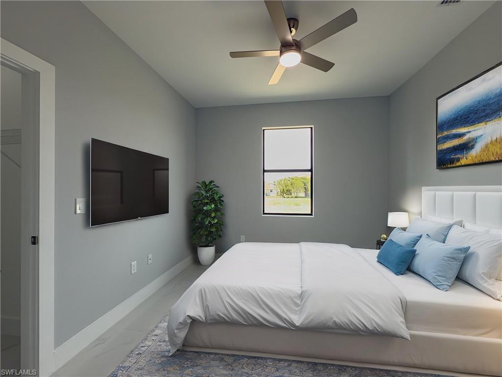 Bedroom with baseboards, ceiling fan, and marble finish floor