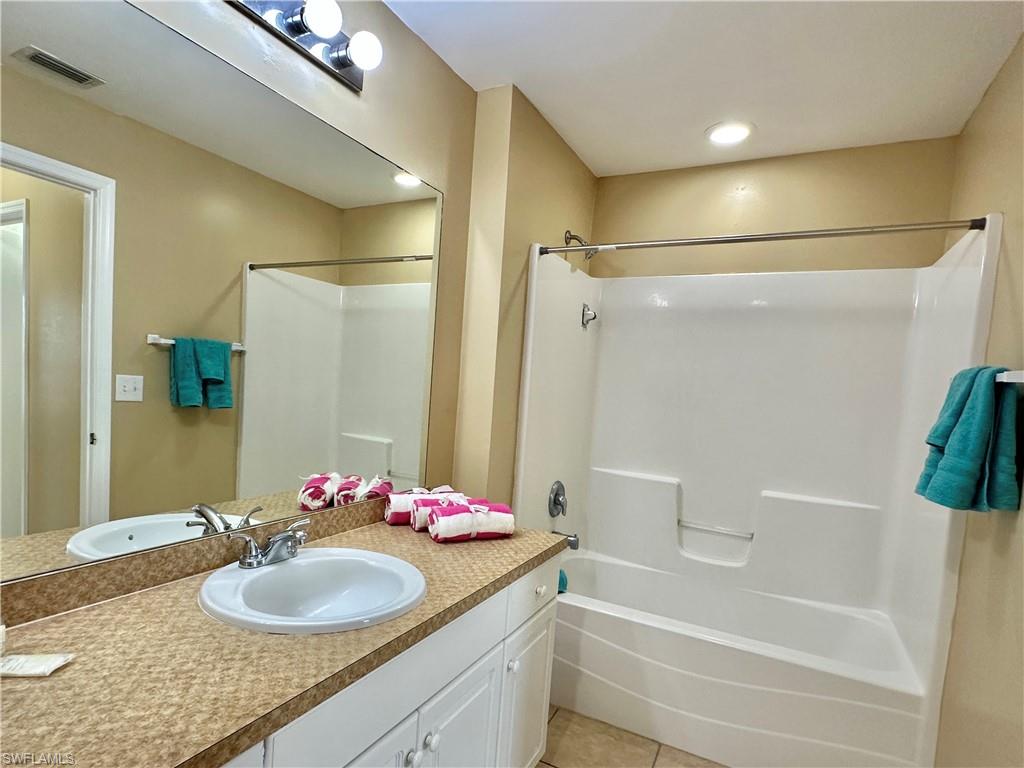 Primary Mirrored Vanity with Combo Tub/Shower